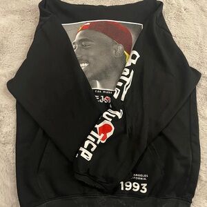 Black Crewneck Sweater with Vintage Graphic Design